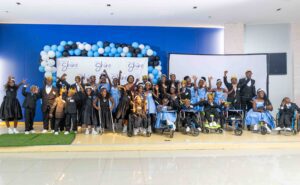 After a successful dance session, all the contestants pause for a special photo moment with the CURE and CBM Executive Directors, Frida Kabaso Phiri and Dr. Linda Kasonka Nonde.